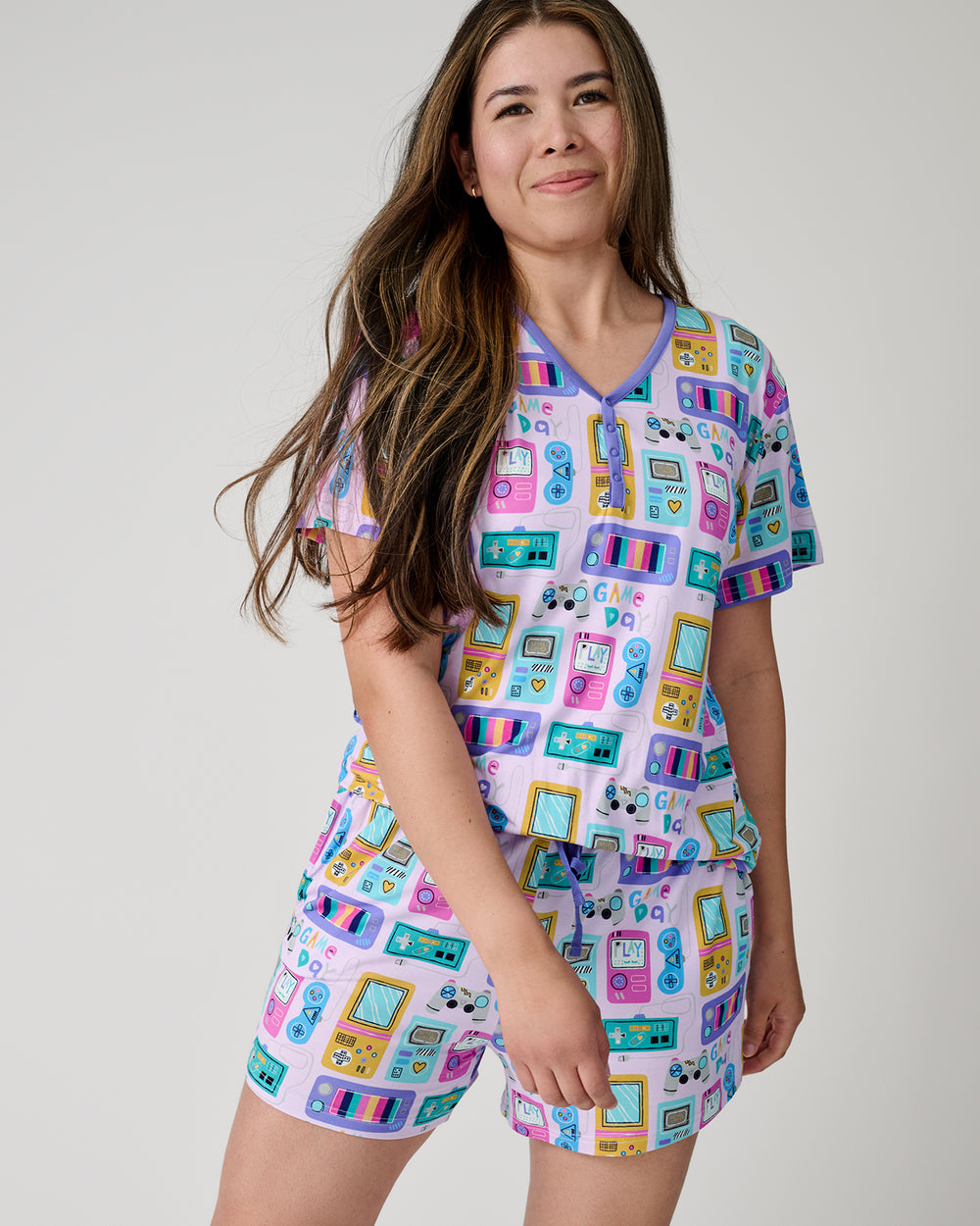Front view of woman wearing the Purple Game On Women's Pajama Shorts and Top
