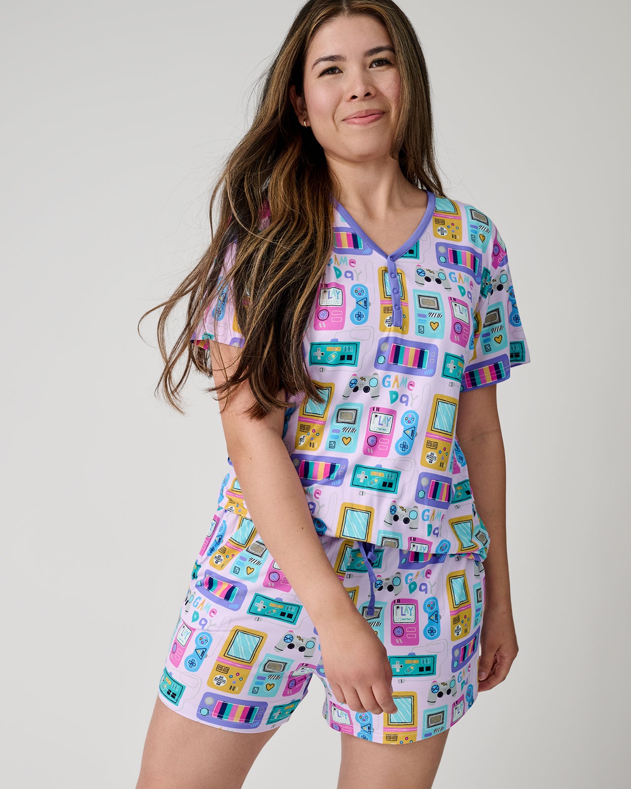 Front view of woman wearing the Purple Game On Women's Pajama Shorts and Top