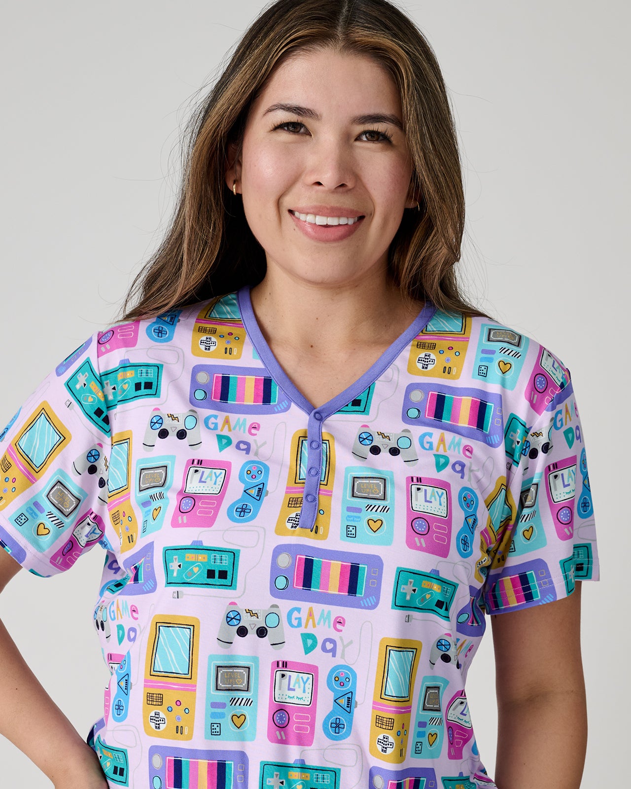 Close up of woman wearing the Purple Game On Women's Short Sleeve Pajama Top
