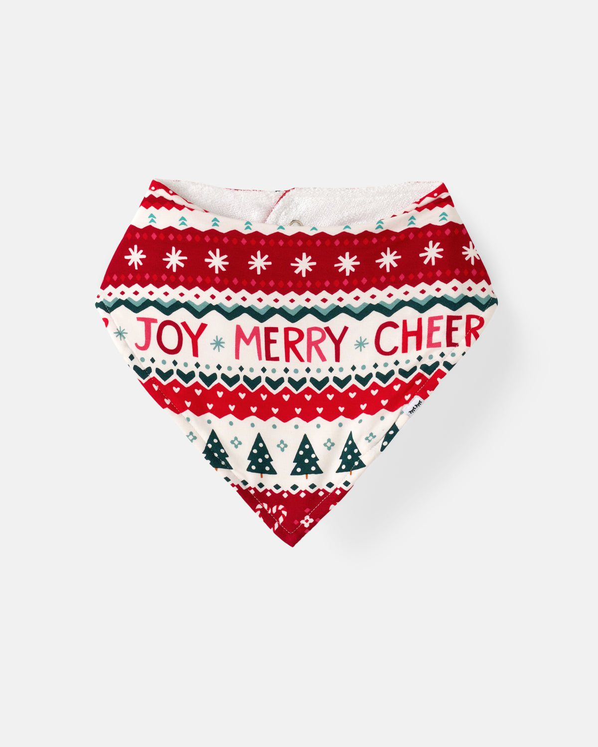 A festive triangular bandana bib featuring a red and white holiday knit pattern with 'JOY MERRY CHEER' printed across the center, set against a light gray background.
