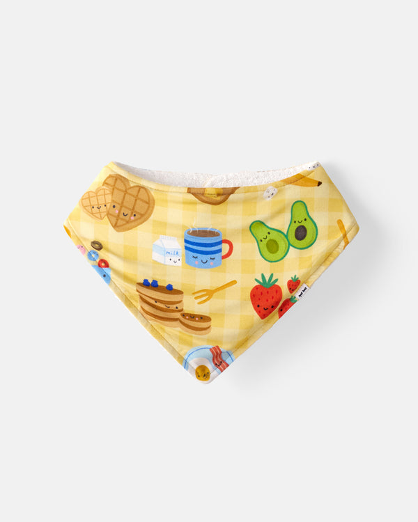 Flat lay of the Breakfast Bunch Bandana Bib