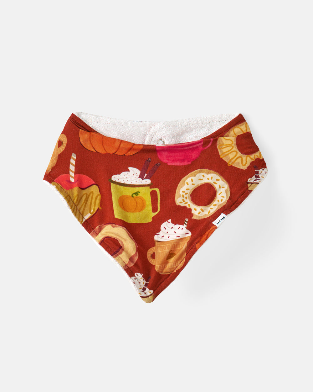 Flat lay of the Harvest Sweets Bandana Bib