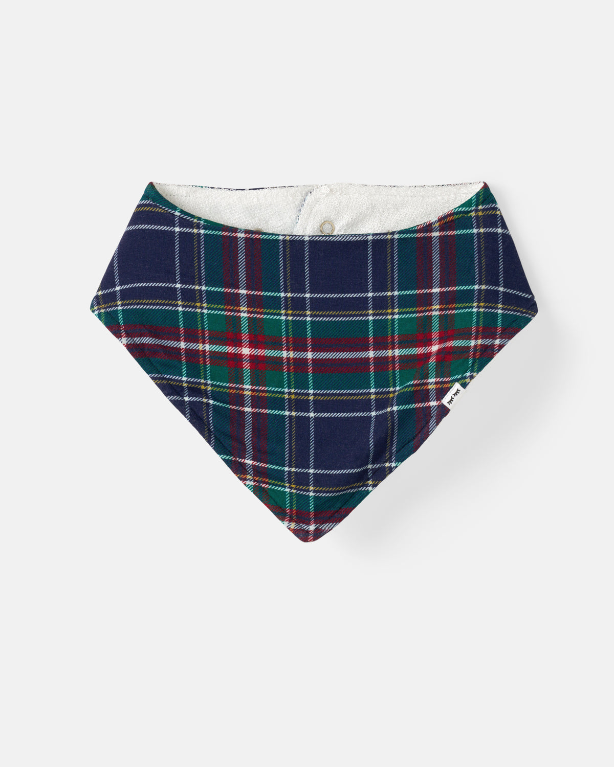 A triangular bandana-style pet bib with a navy blue, green, red, and white plaid pattern, featuring a white fleece lining and snap closure, shown on a light gray background.