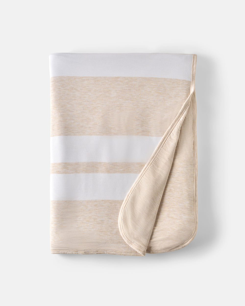 Flat lay of the Heather Oatmeal Stripe Oversized Cloud Blanket®