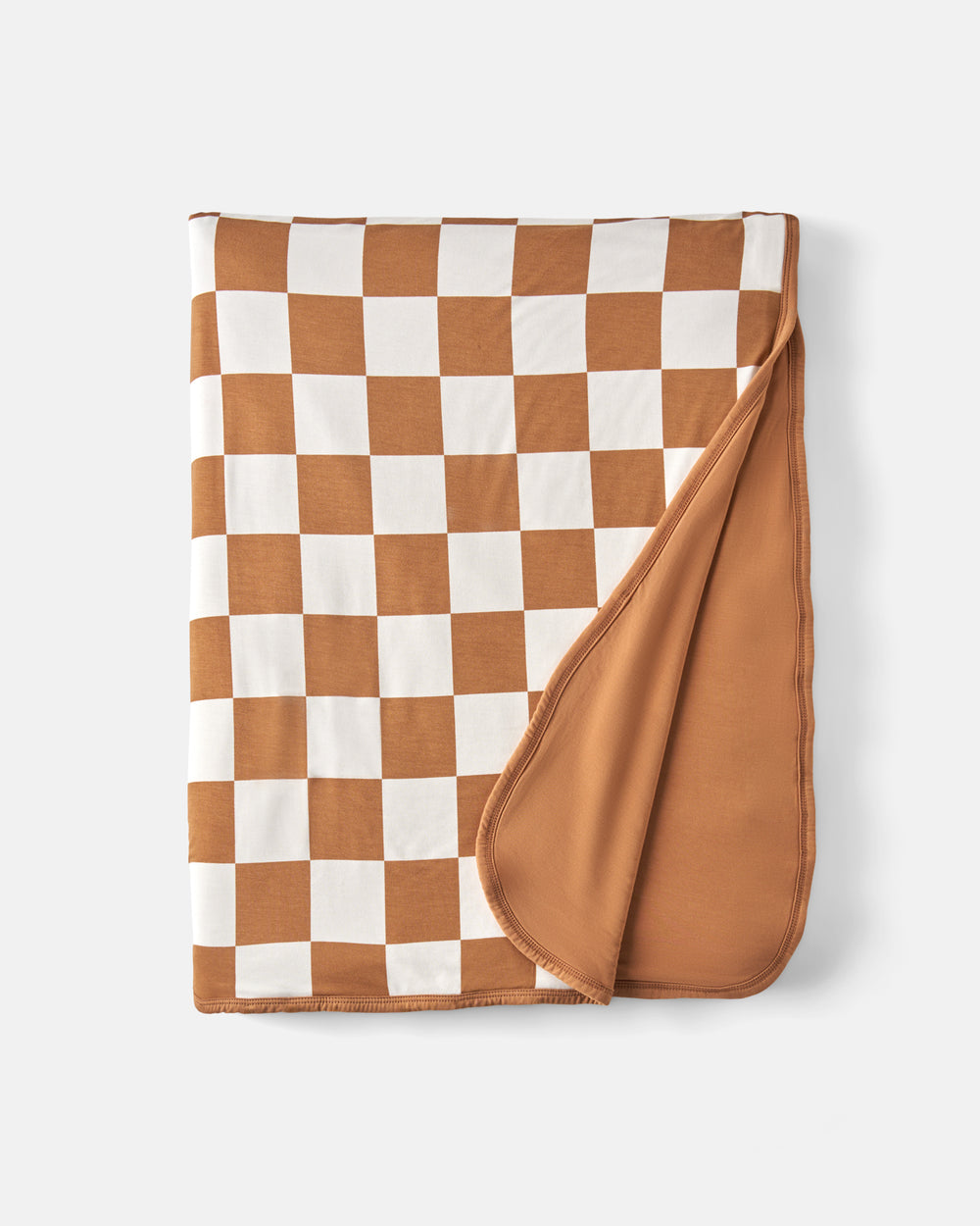 Flat lay of the Caramel Checks Oversized Cloud Blanket®