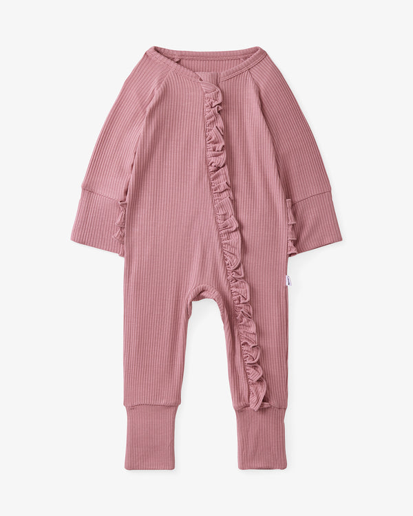 Flat lay of the Rosewood Ribbed Ruffle Zippy