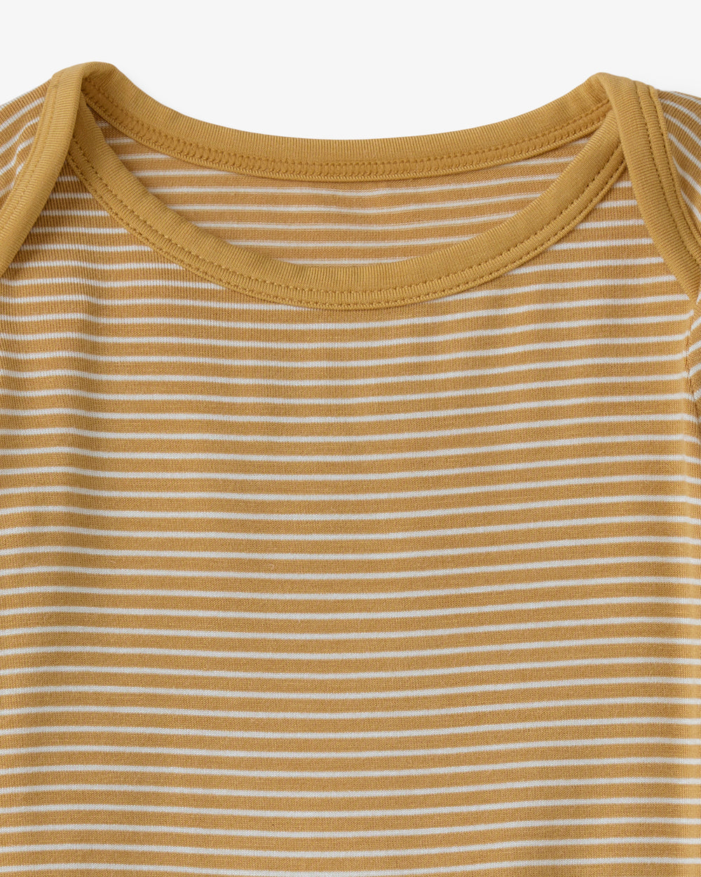 Close up flat lay of the neck opening on the Hazelwood Stripe Crescent Zippy