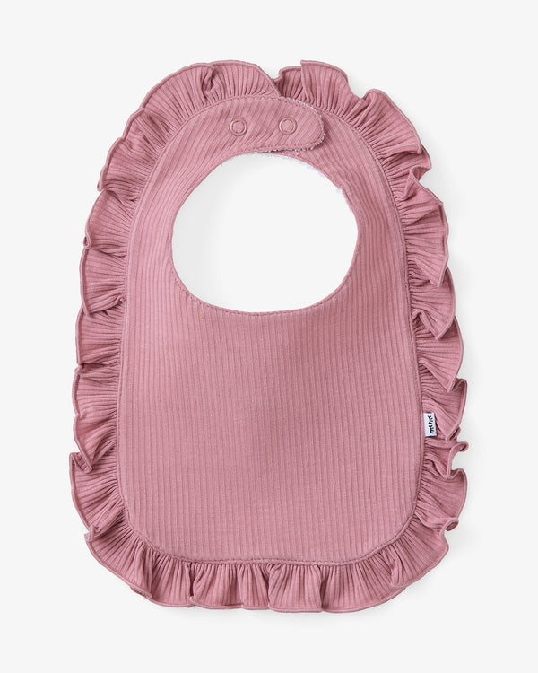 Flat lay of the Rosewood Ribbed Ruffle Bib