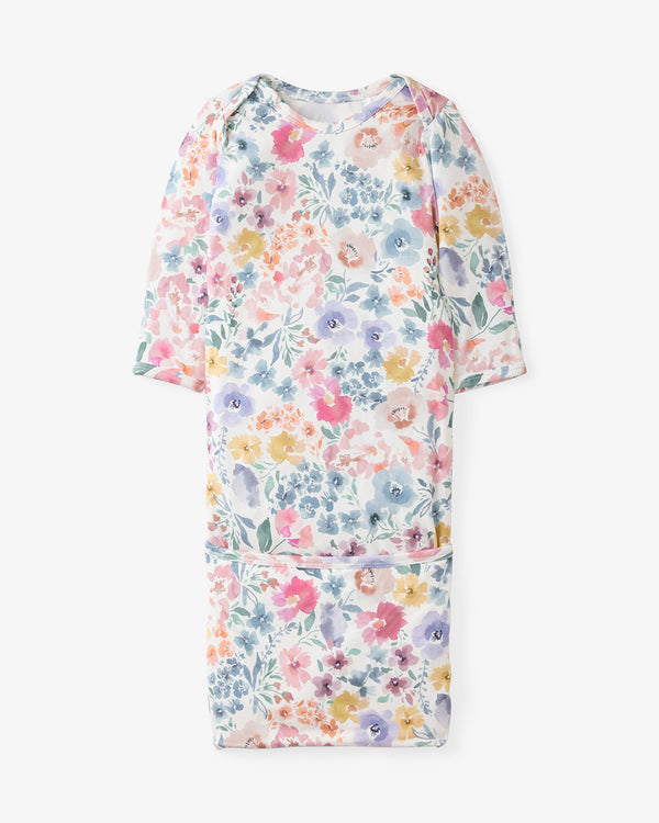 Flat lay of the Tiny Blooms Infant Gown