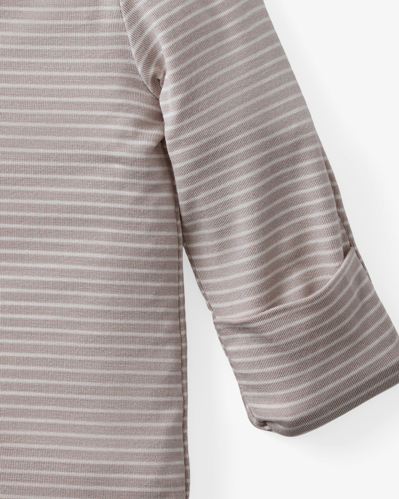 Close up of the hand fold over feature on the Dove Gray Stripe Infant Gown