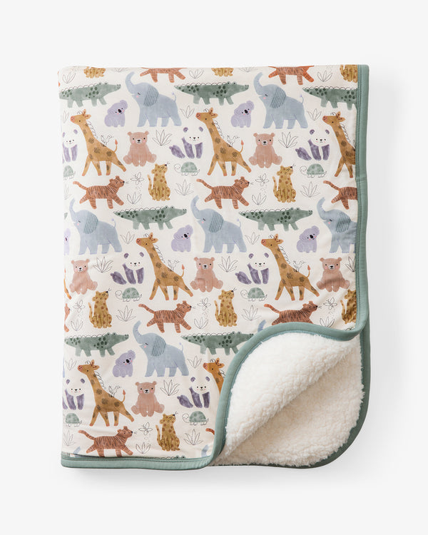 Flat lay of the Sweet Safari Mini Cloud Blanket