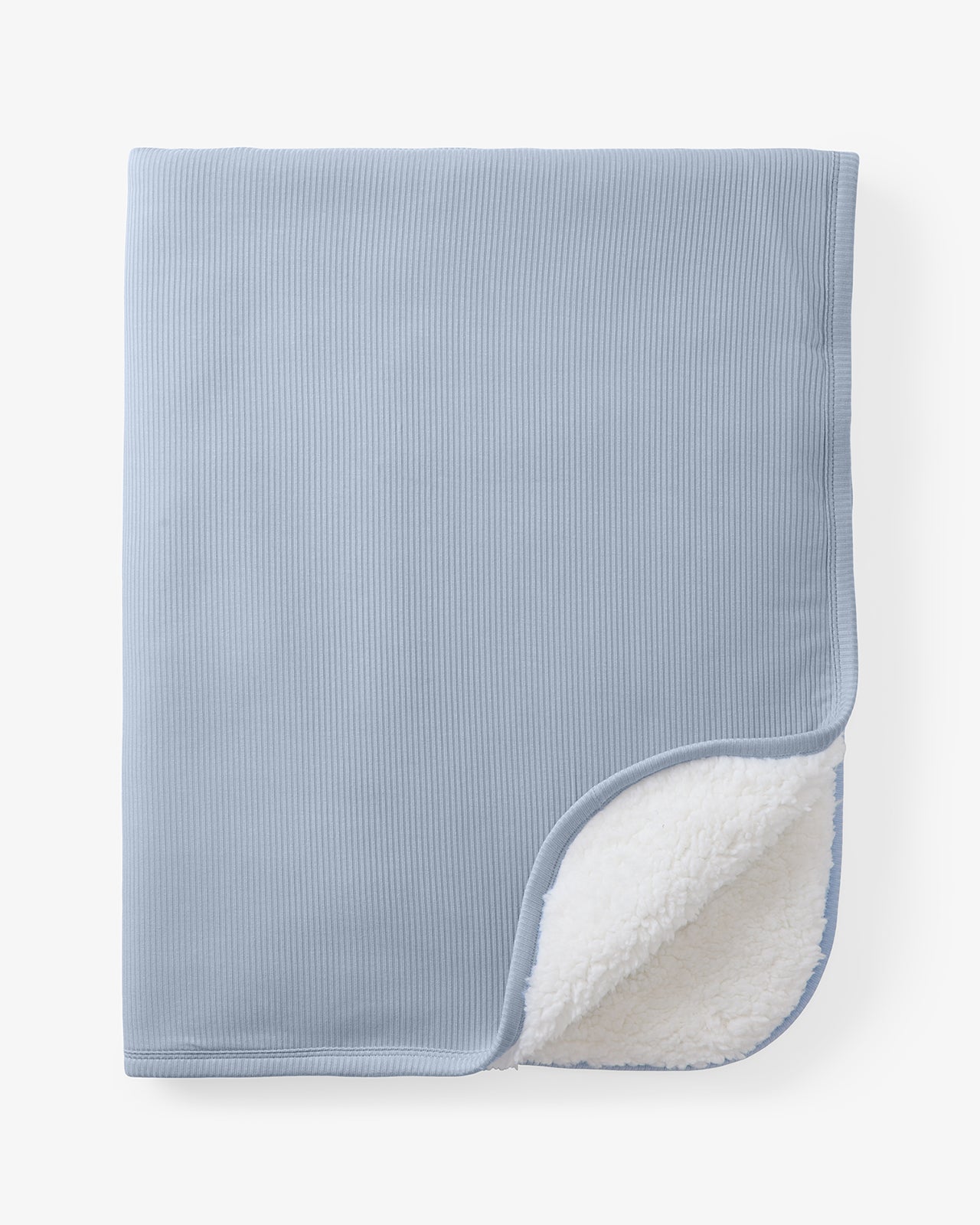 Flat lay of the Light Fog Layette Ribbed Cloud Blanket