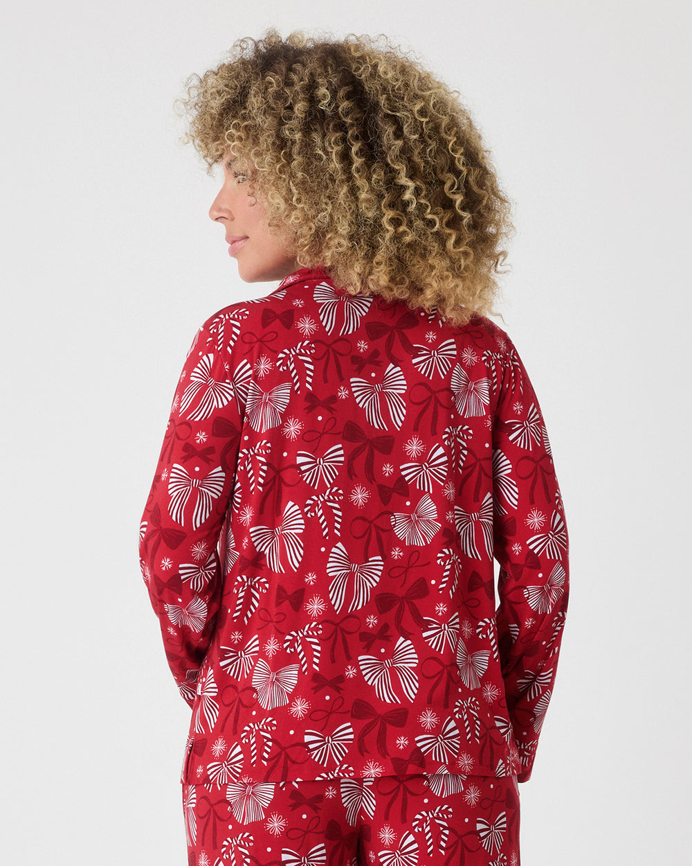Back view of woman wearing the Holiday Bows Women's Long Sleeve Pajama Set