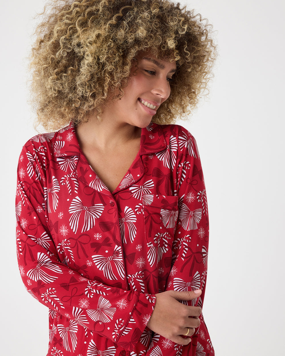 Close up of woman wearing the Holiday Bows Women's Long Sleeve Pajama Set