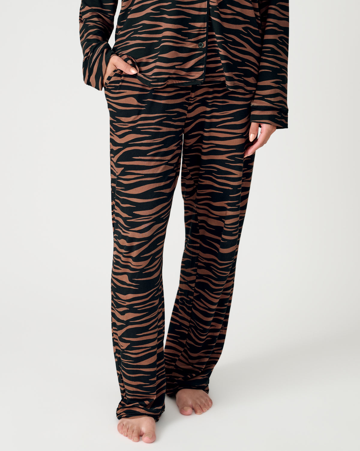 Close up of woman wearing the Wild Stripes Women's Long Sleeve Pajama Set
