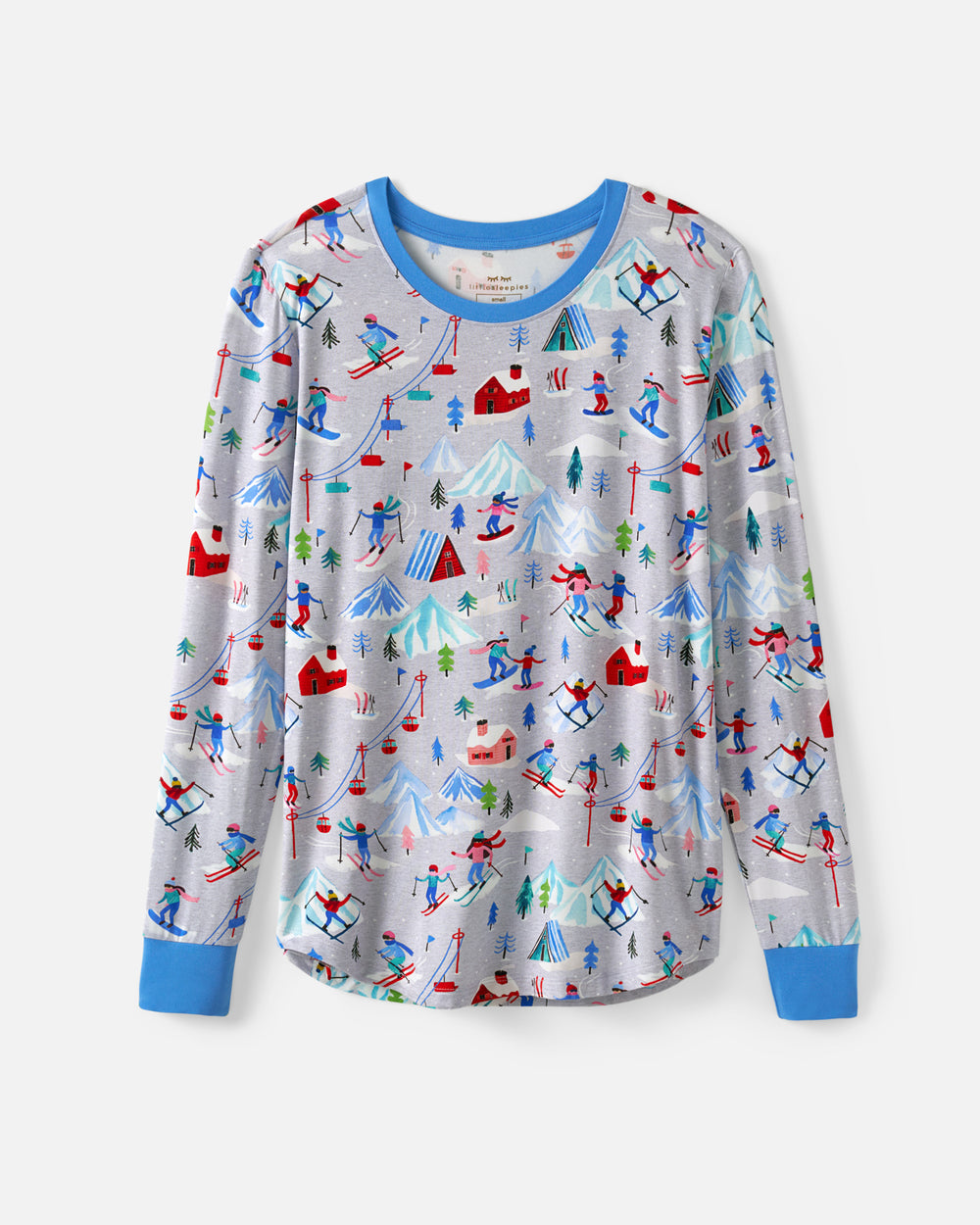 A long-sleeve crewneck shirt for kids featuring a colorful ski resort print on a light gray background, with blue ribbed collar, cuffs, and hem.