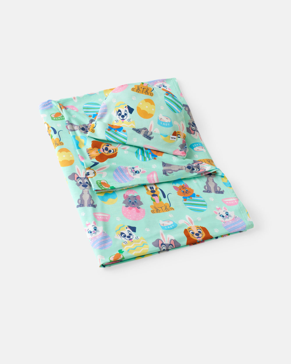Flat lay of the Disney Peekaboo Pets Swaddle & Hat Set