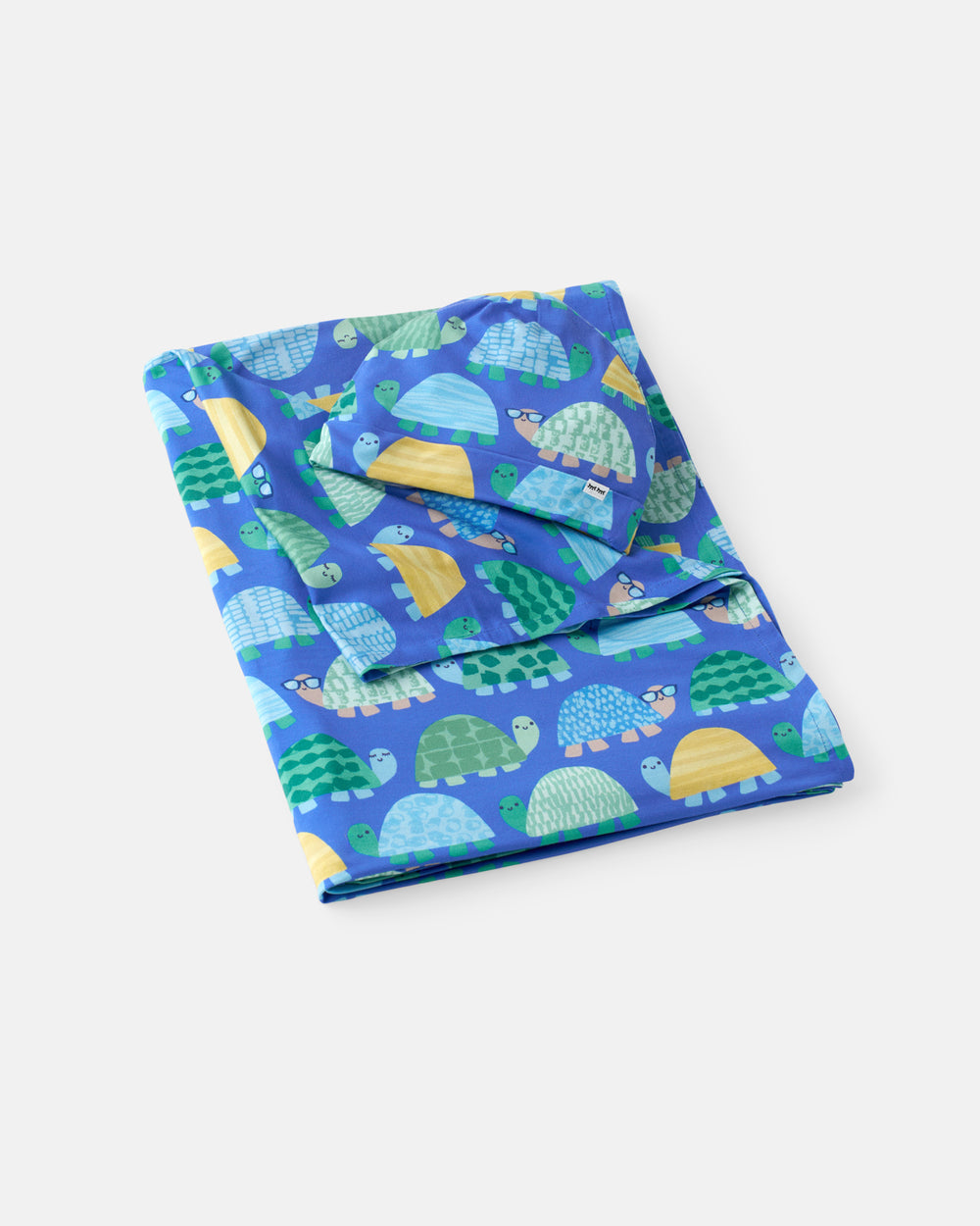 Flat lay of the Shell Parade Swaddle & Hat Set