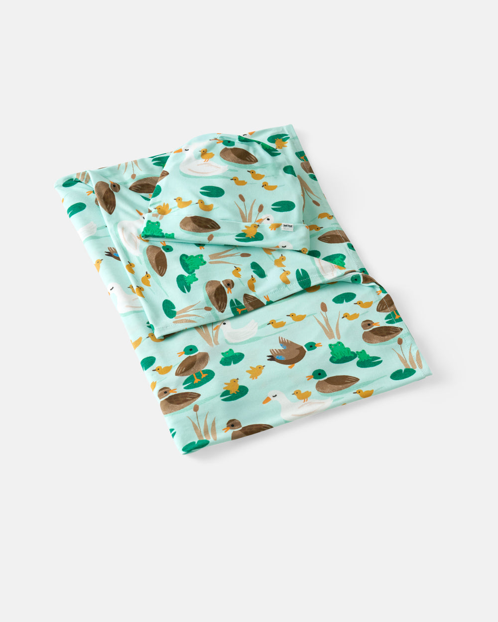 Flat lay of the Puddle Jumpers Swaddle & Beanie Set