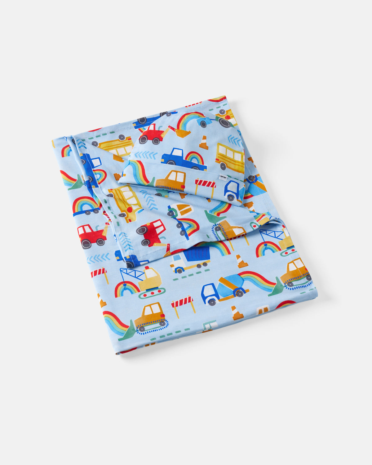 Flat lay of the Rainbow Trucks Swaddle & Beanie Set