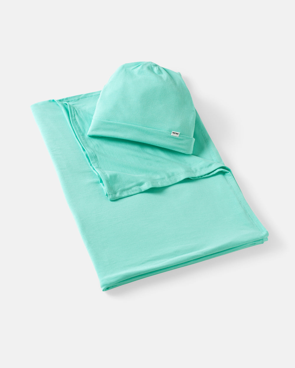 Flat lay of the Ocean Mist Swaddle & Beanie Set