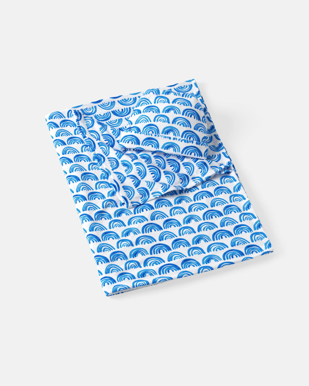 Flat lay of the Blue Rainbows Swaddle & Beanie Set