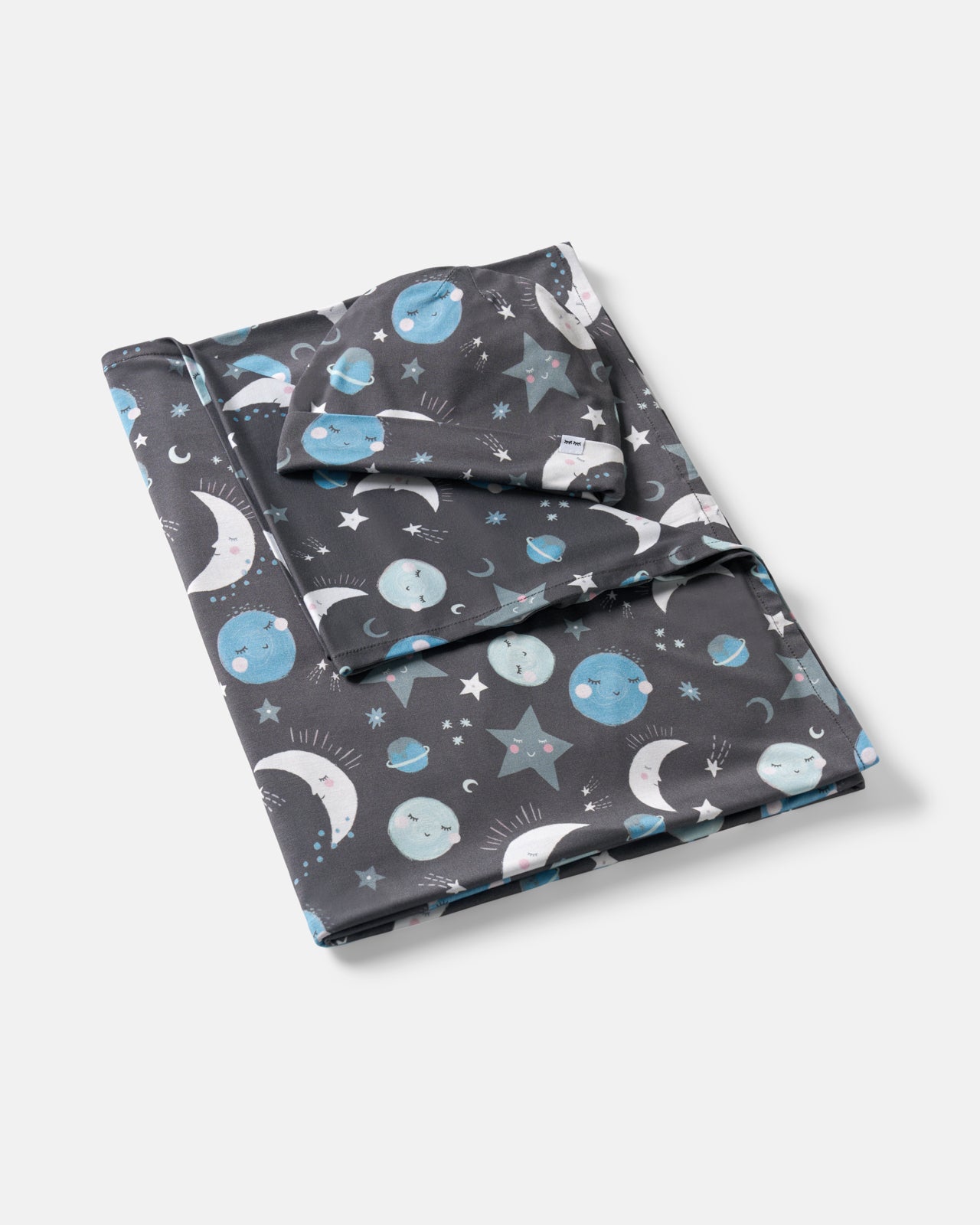 Flat lay of the Blue To The Moon & Back Swaddle & Beanie Set