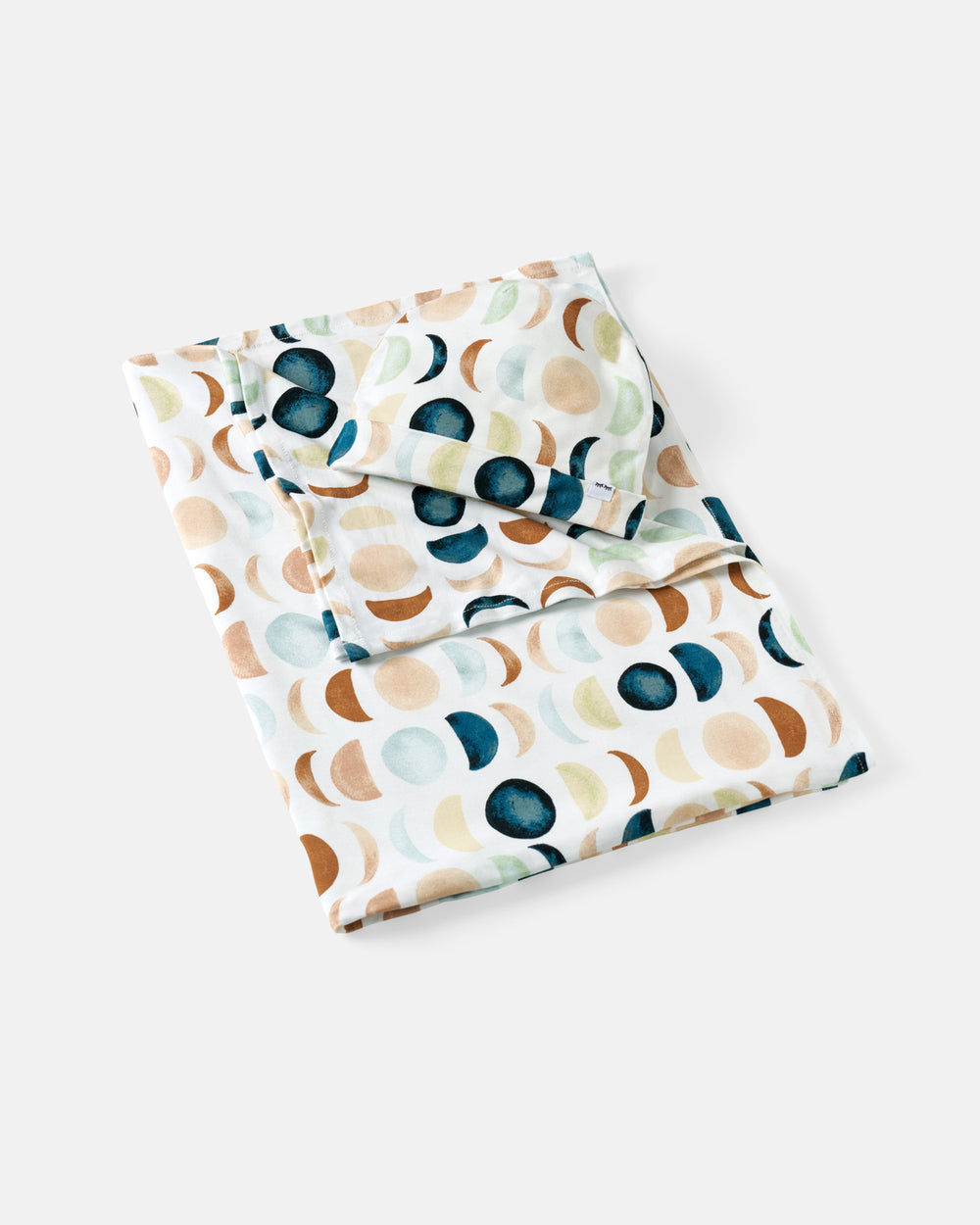 Flat lay of the Luna Neutral Swaddle & Beanie Set