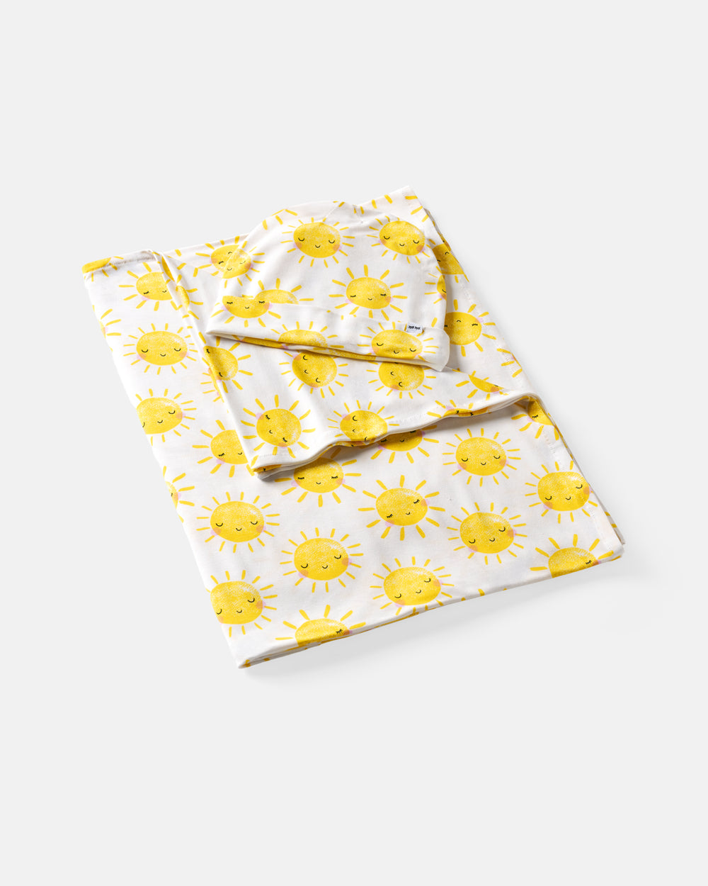 Flat lay of the Sunshine Swaddle & Beanie Set