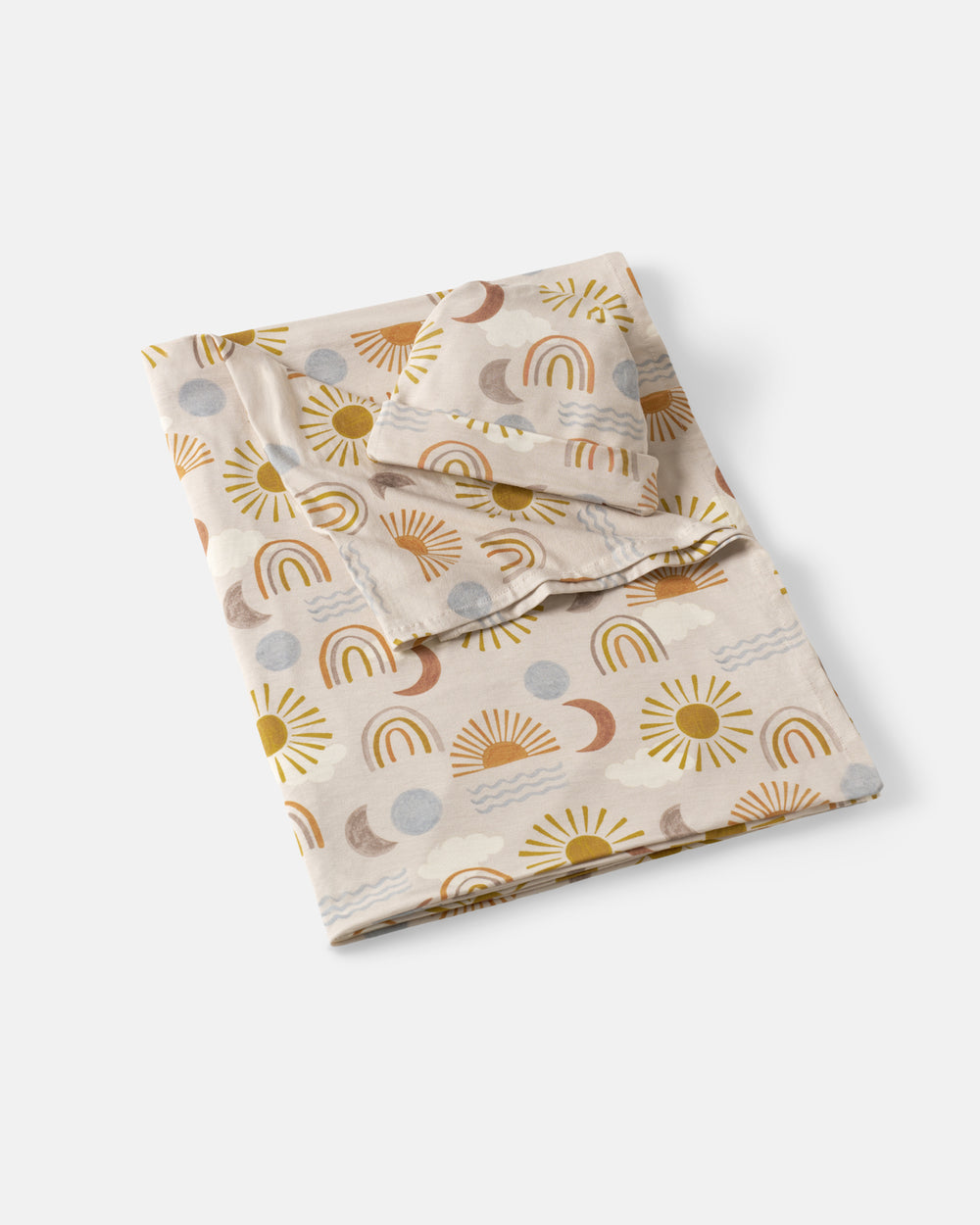 Flat lay of the Desert Sunrise Swaddle & Beanie Set