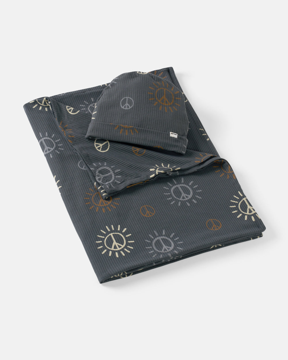 Flat lay of the Peace & Love Ribbed Swaddle & Beanie Set