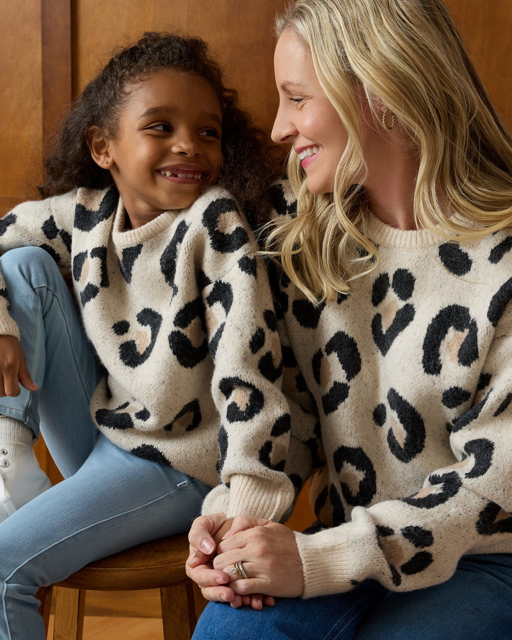 Woman and child wearing matching Snowy Leopard Drop Shoulder Sweaters