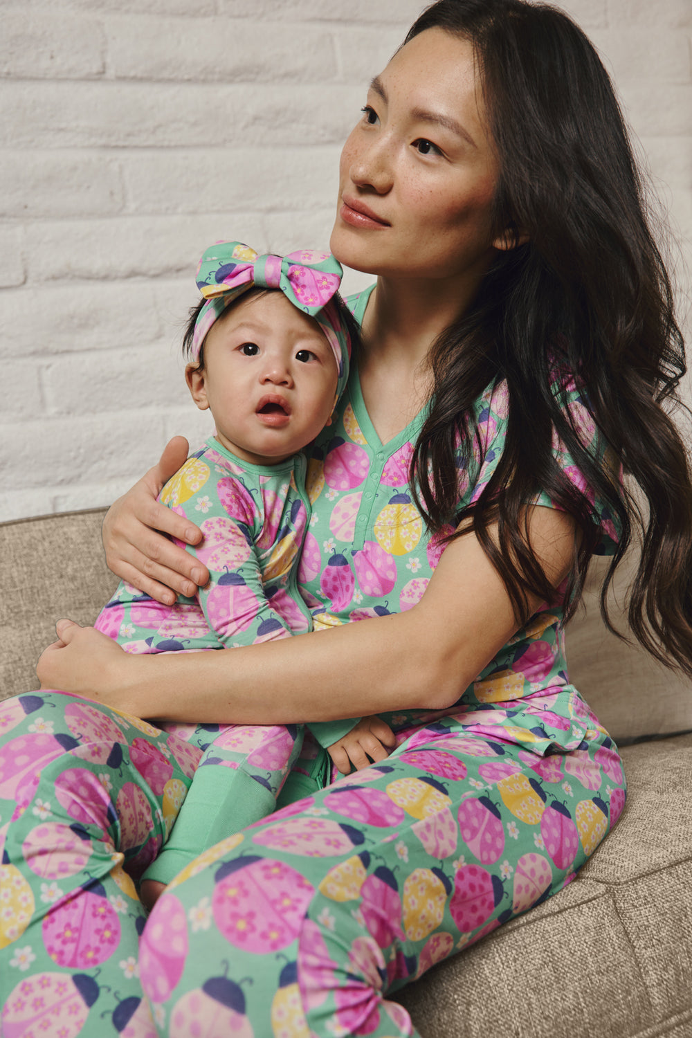 Mother and daughter wearing matching Ladybug Meadow pajamas