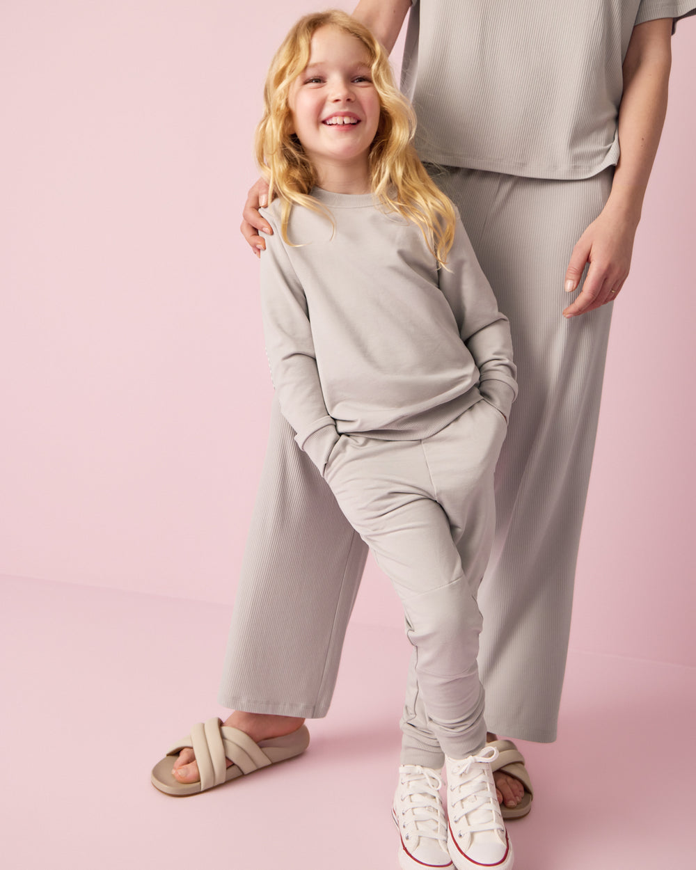 Girl standing in front of a woman wearing the Dove Gray Jogger 