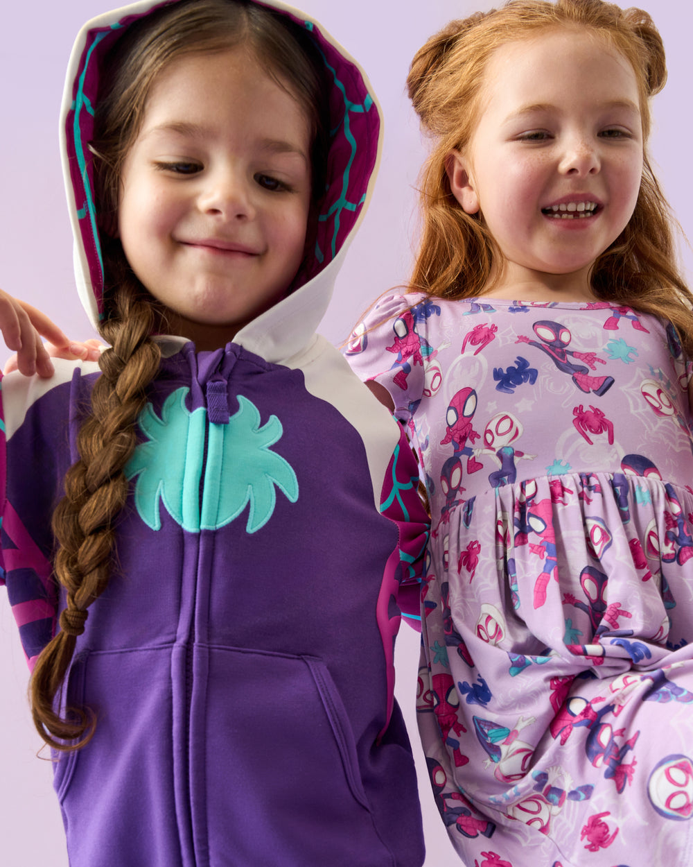 Two girls wearing a Spidey Play Hoodie and Dress 