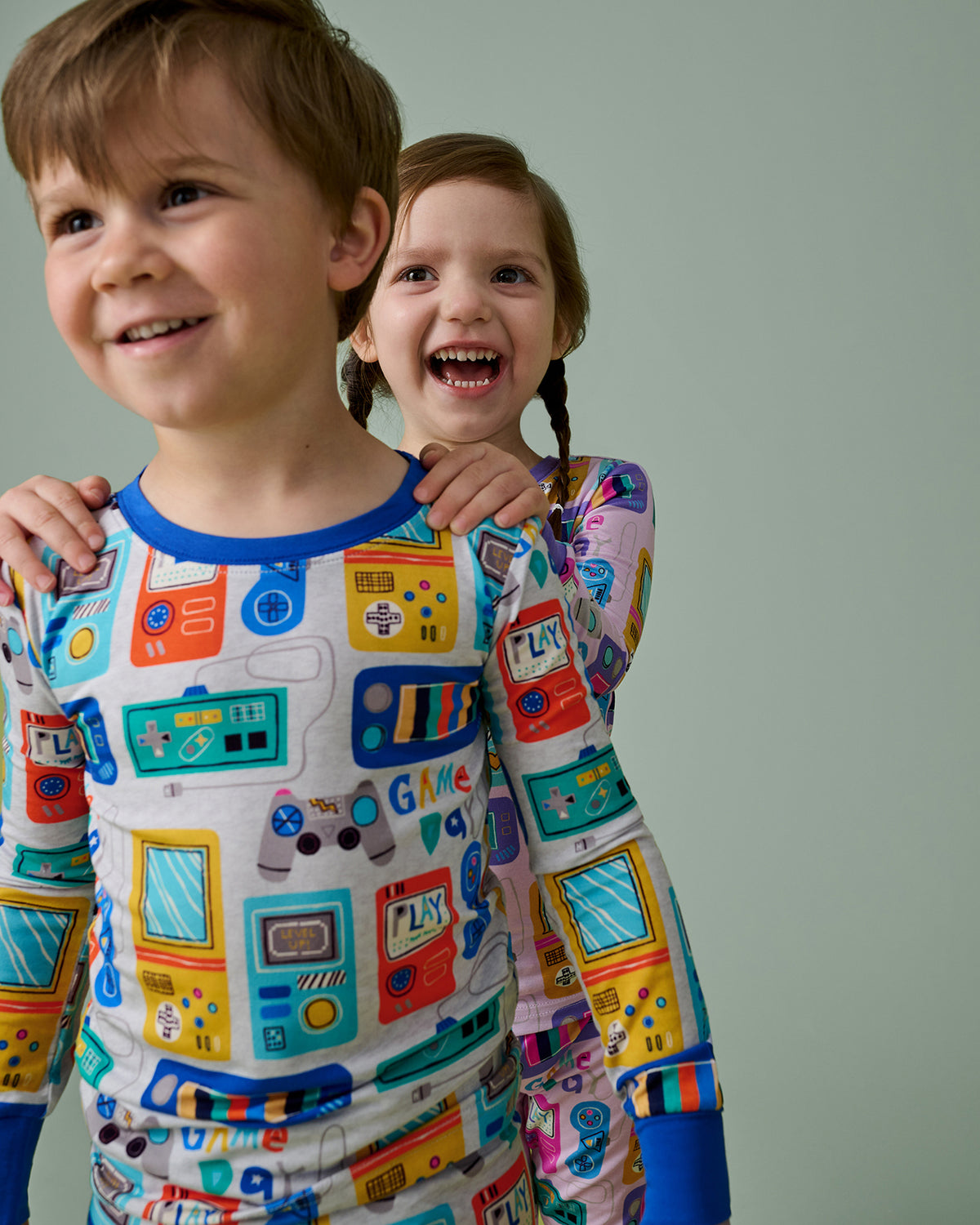 Close up of child wearing the Game On Two-Piece Pajama Set