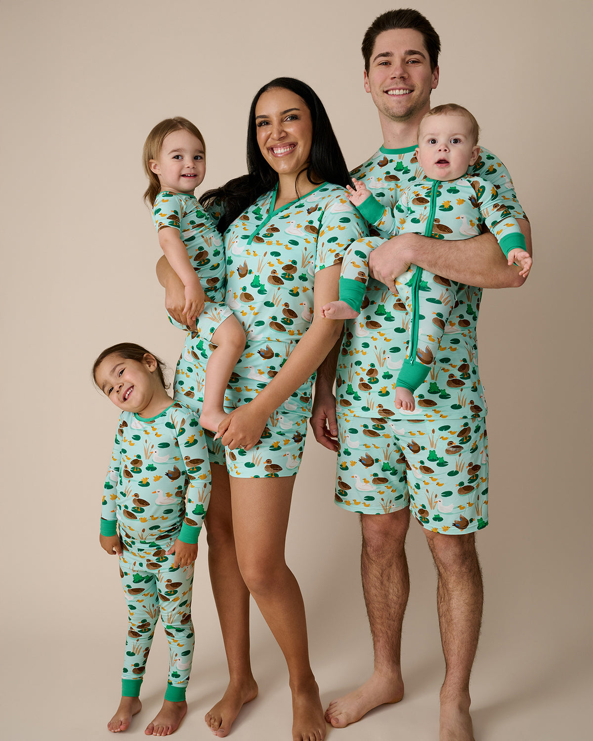 Family of five wearing matching Puddle Jumpers Pajamas
