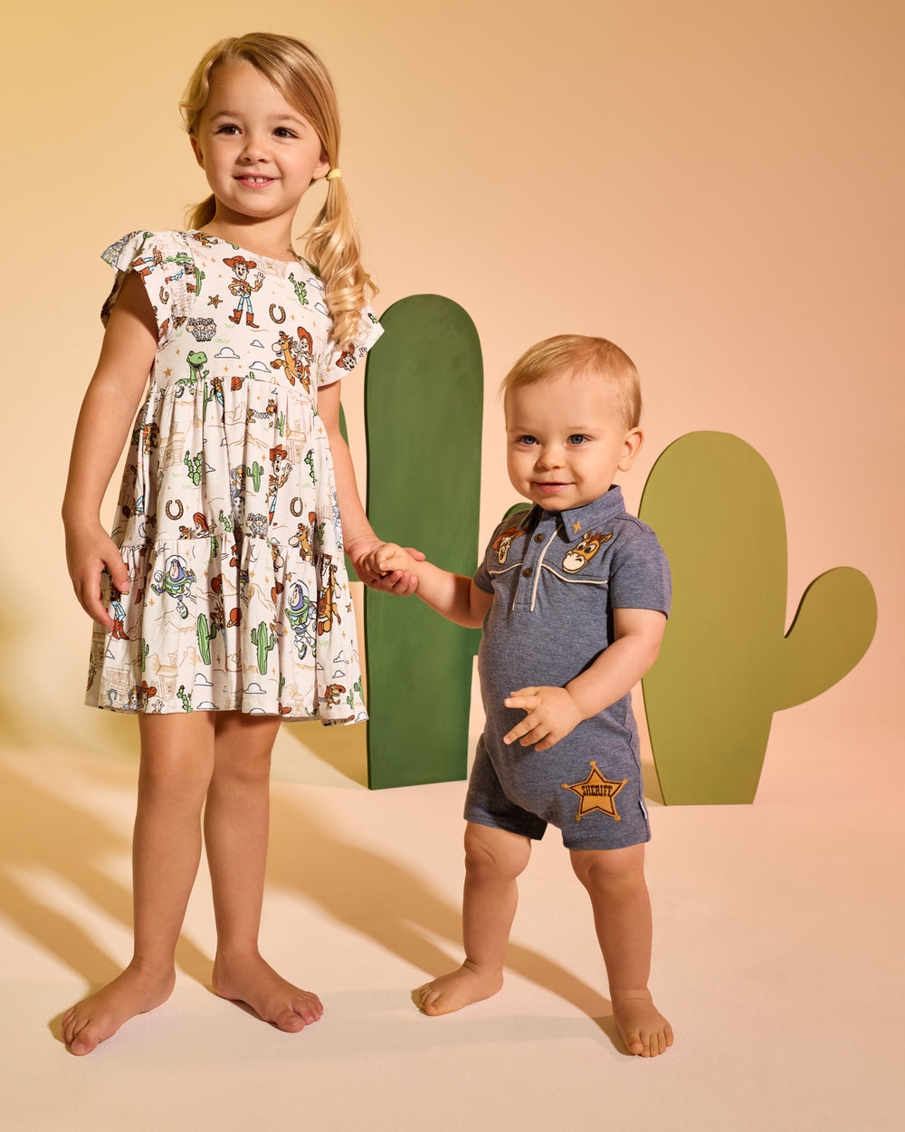 Two kids wearing Disney & Pixar Toy Story  daywear styles