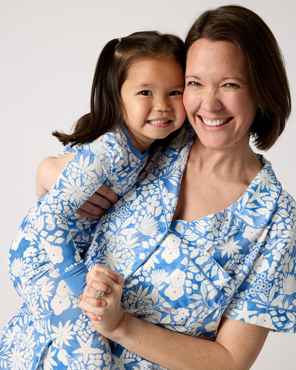 Mother and daughter wearing matching Azure Garden PJ sets