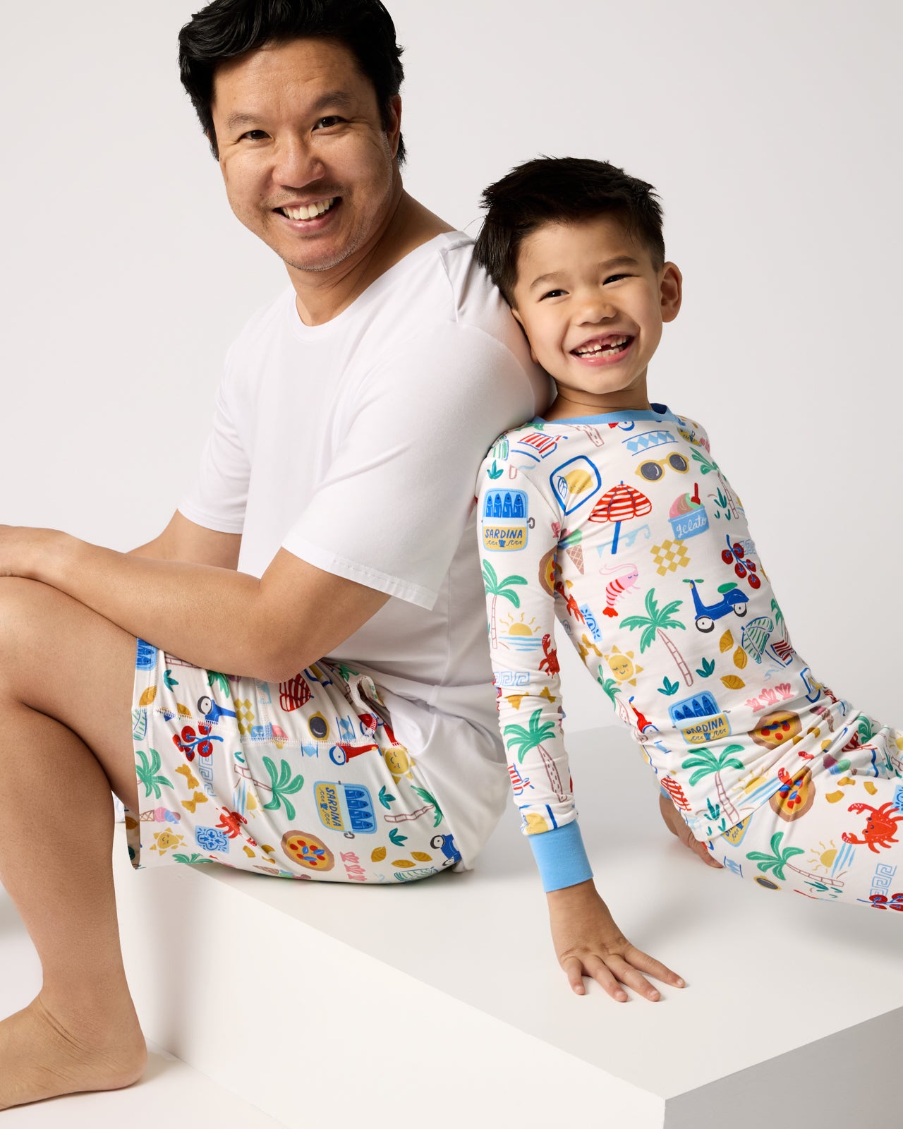 Father and son wearing matching Ciao Bella pajamas