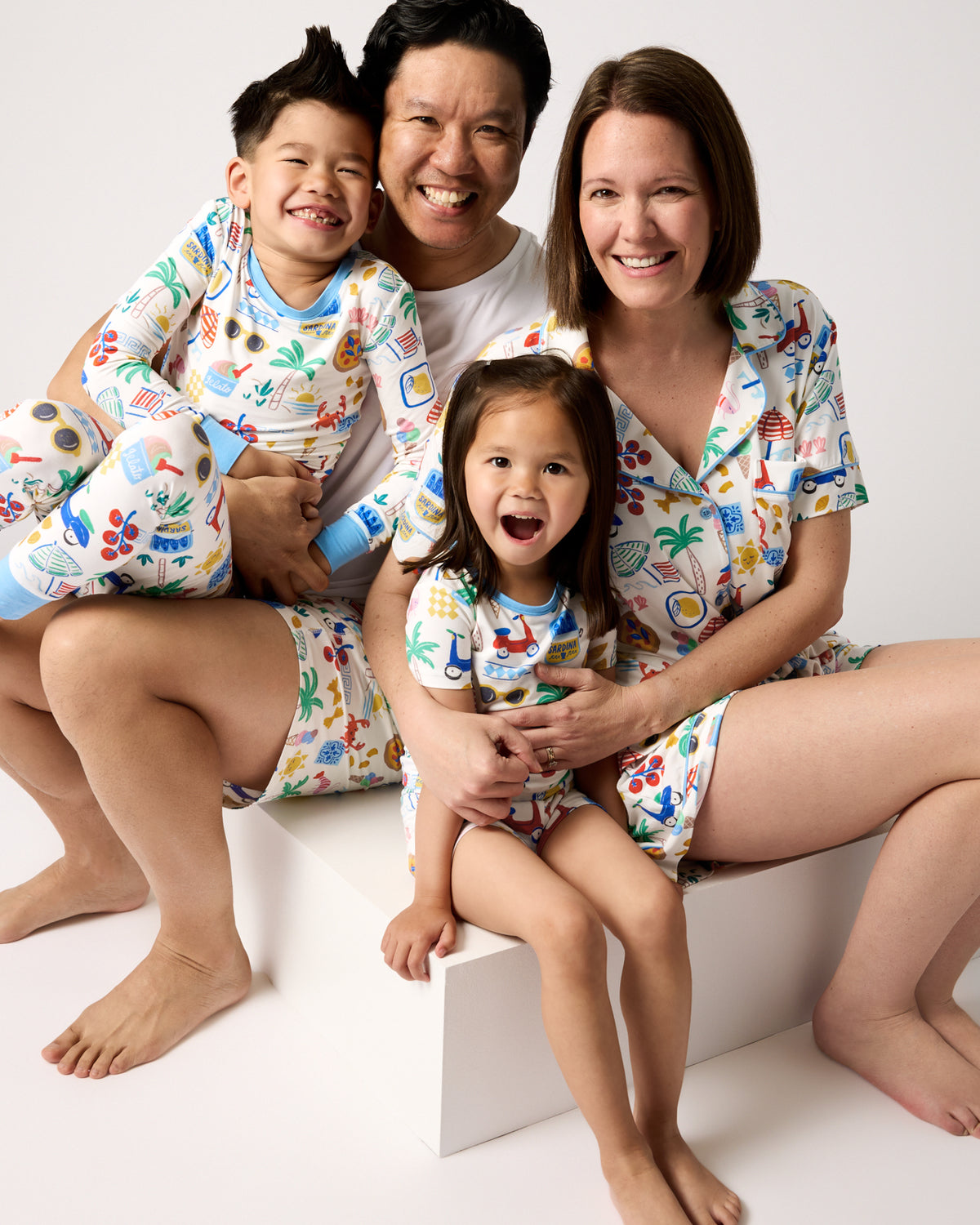 Family of four wearing matching Ciao Bella Summer Pajamas