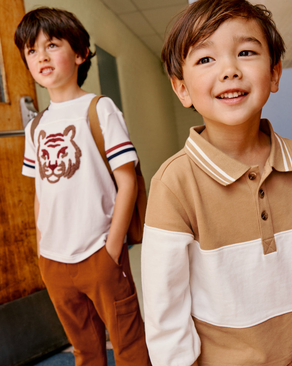 Two boys wearing Back to School shirts