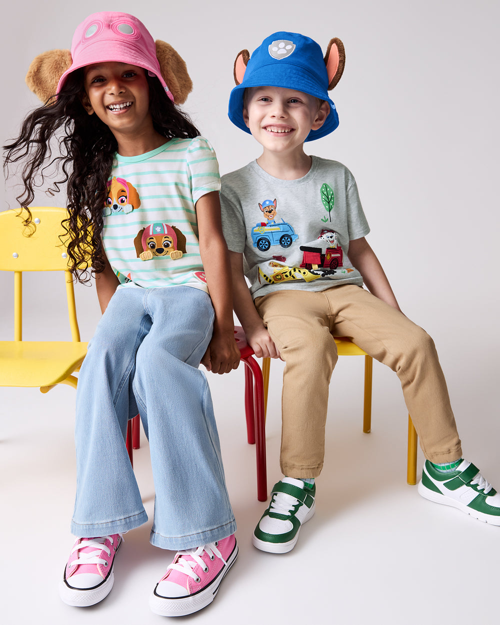 Two children wearing play styles from the PAW Patrol collection at Little Sleepies