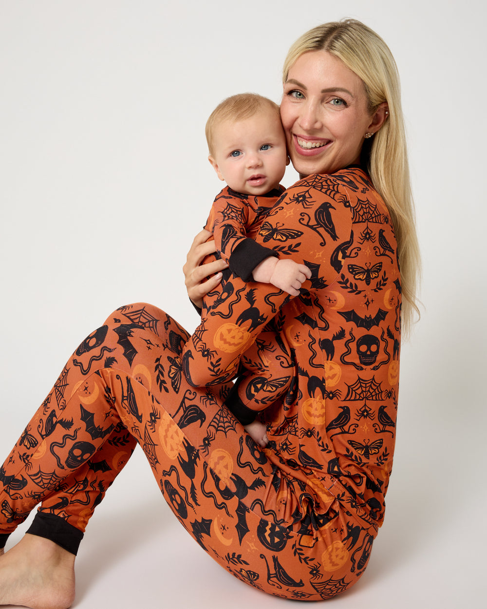Mother and baby wearing matching Midnight Mischief PJs