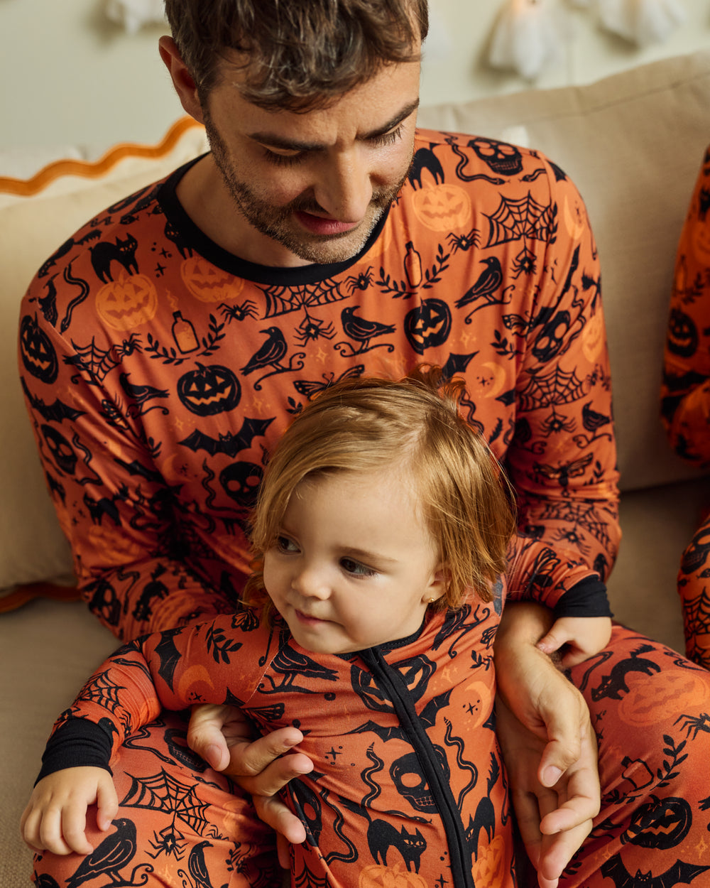 Father and child wearing the Midnight Mischief Men's Long Sleeve Pajama Top