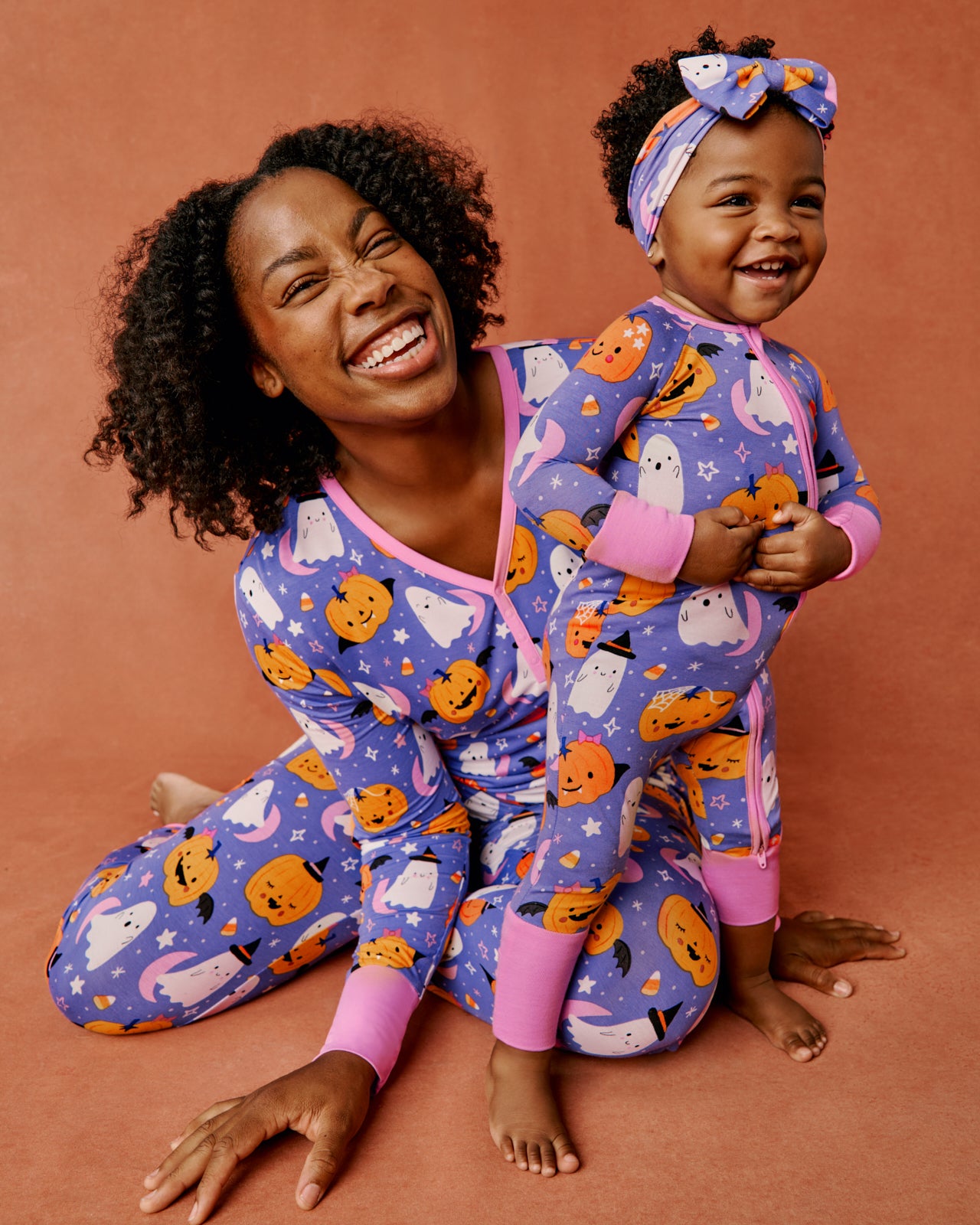 Mother and daughter wearing matching Moonlit Magic glow in the dark PJs