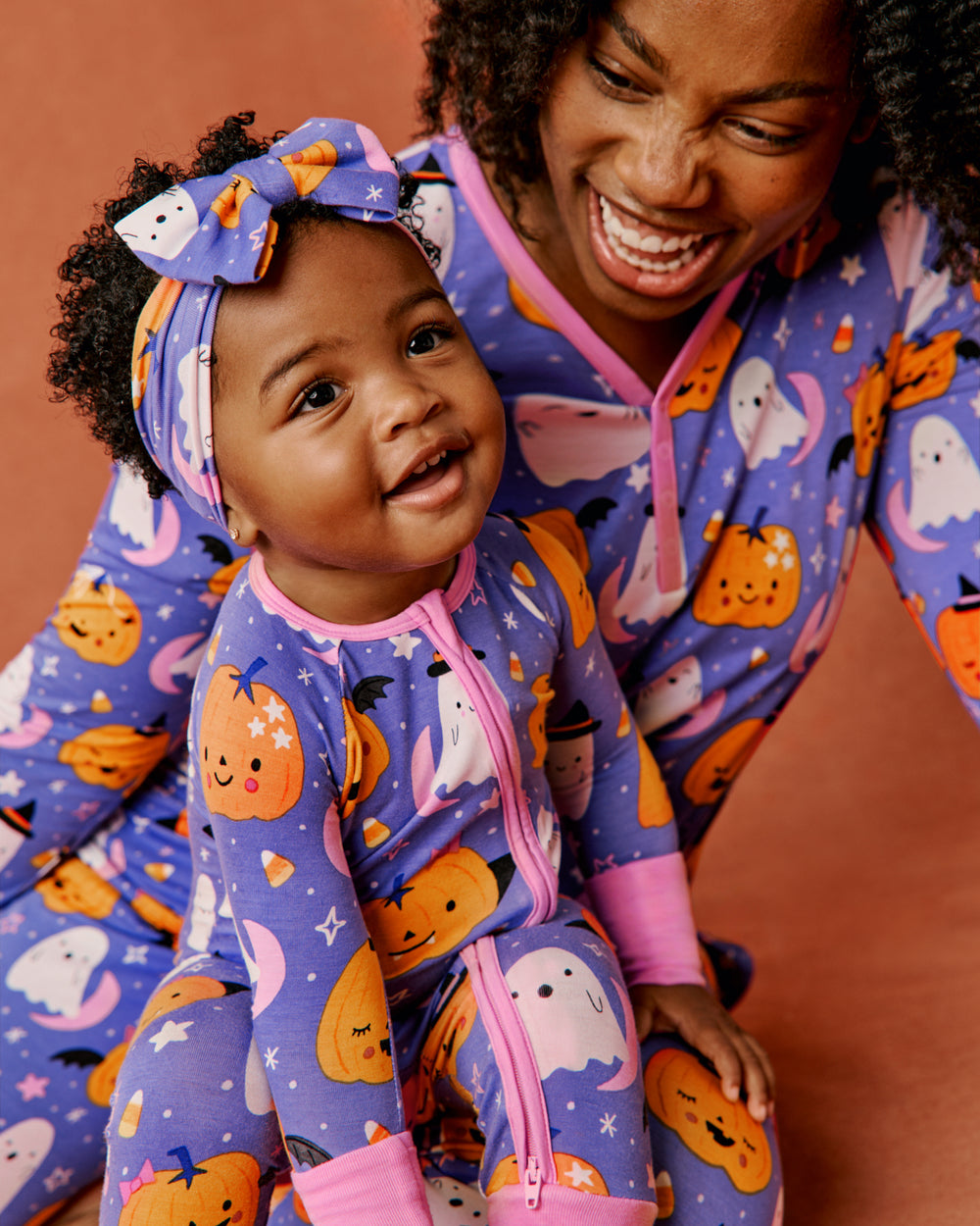 Mother and baby wearing matching Moonlit Magic Purple Pjs