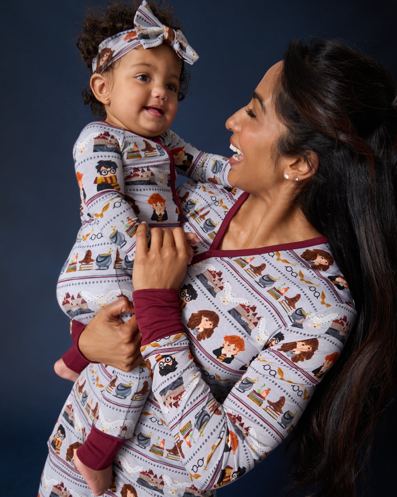 Mother and daughter wearing matching Harry Potter™ Spellbinding Studies Pajamas