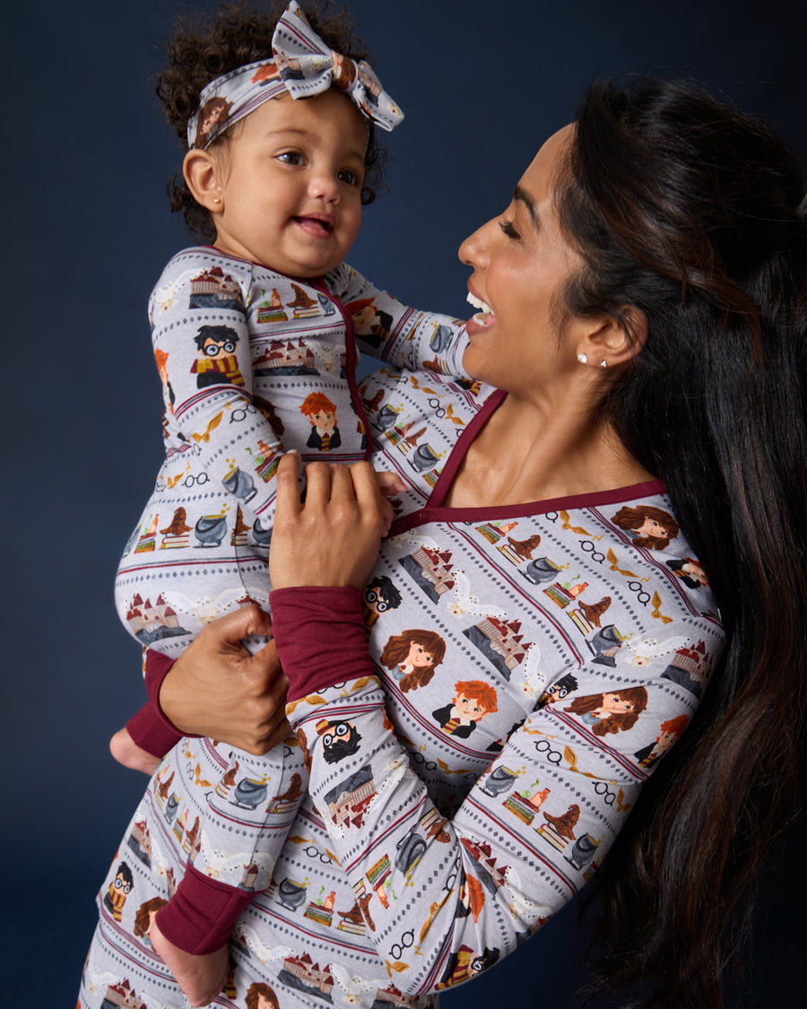 Mother and daughter wearing matching Harry Potter™ Spellbinding Studies Pajamas