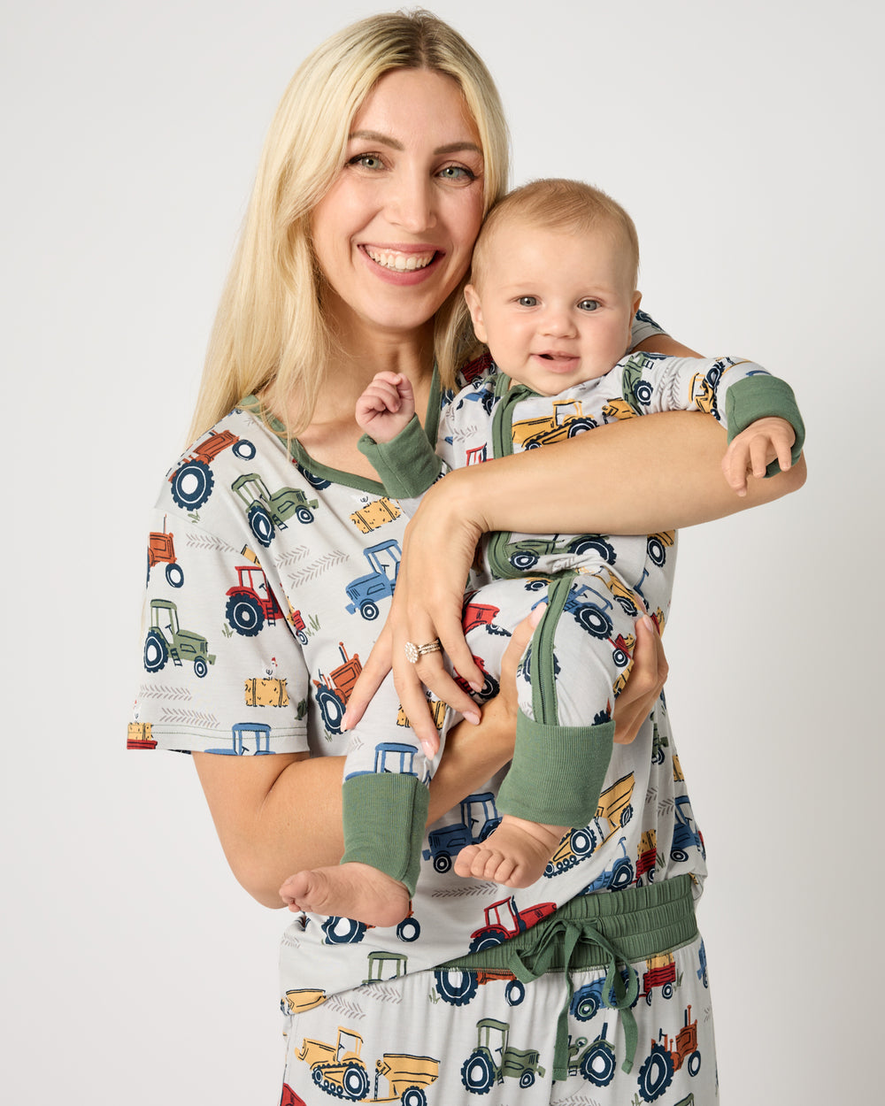 Mother and child wearing matching Tractor Tales PJs